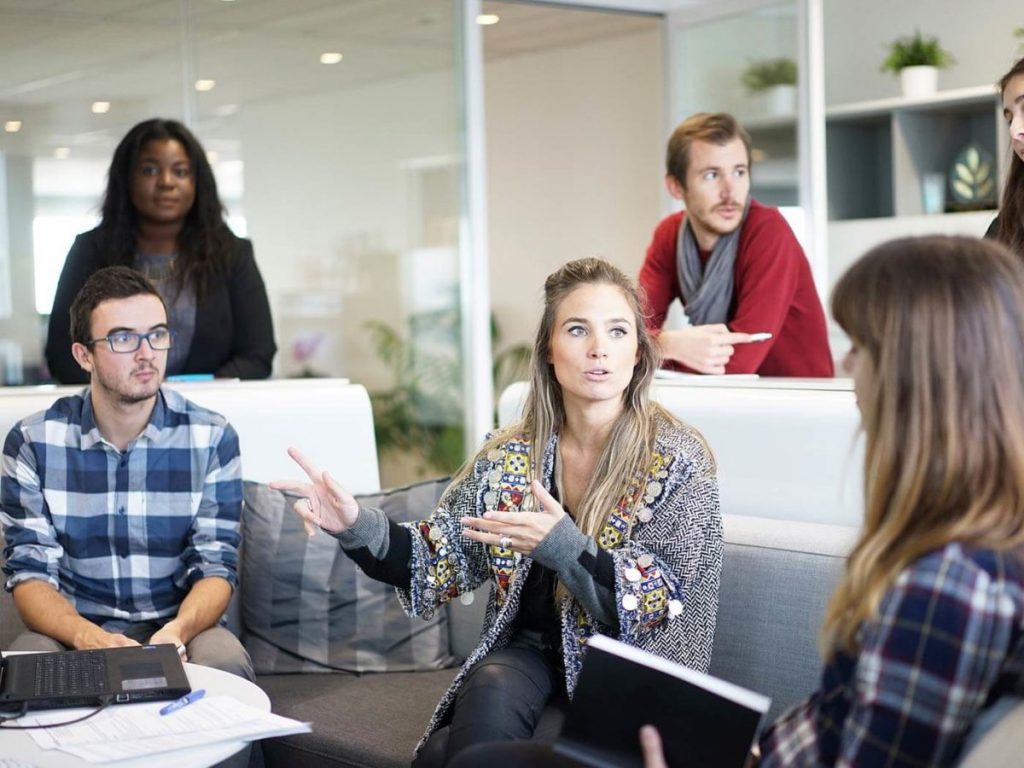 Illustrative photograph of a team in a research discussion